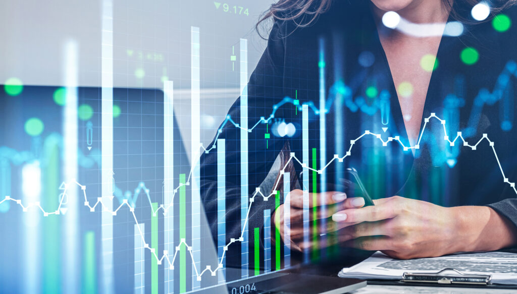 Image of a digital marketer on phone with graph overlay representing data analytics maturity
