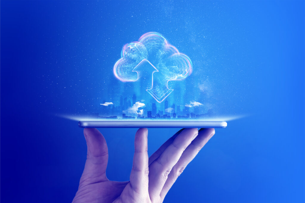 Hand holding phone with imagery above representing how to maximize your cloud investments