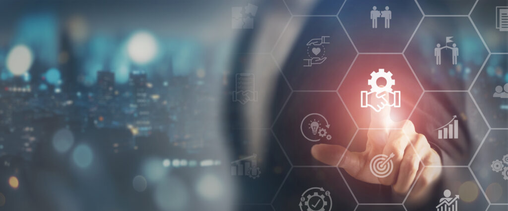 Image of business man pressing a button, representing benefits of IT managed services and partnerships.