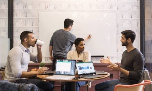 Small conference meeting in modern workspace.